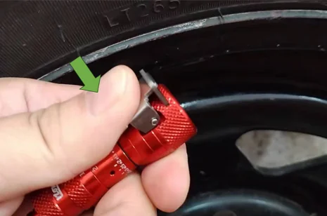 Step 2 - press the clip to open the chuck