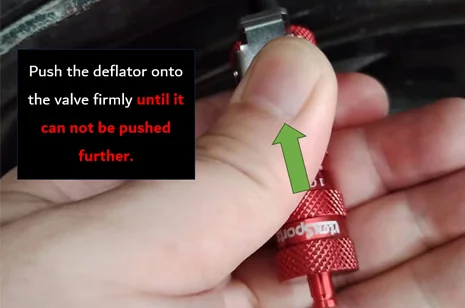 Step 2 - push the deflator onto the valve